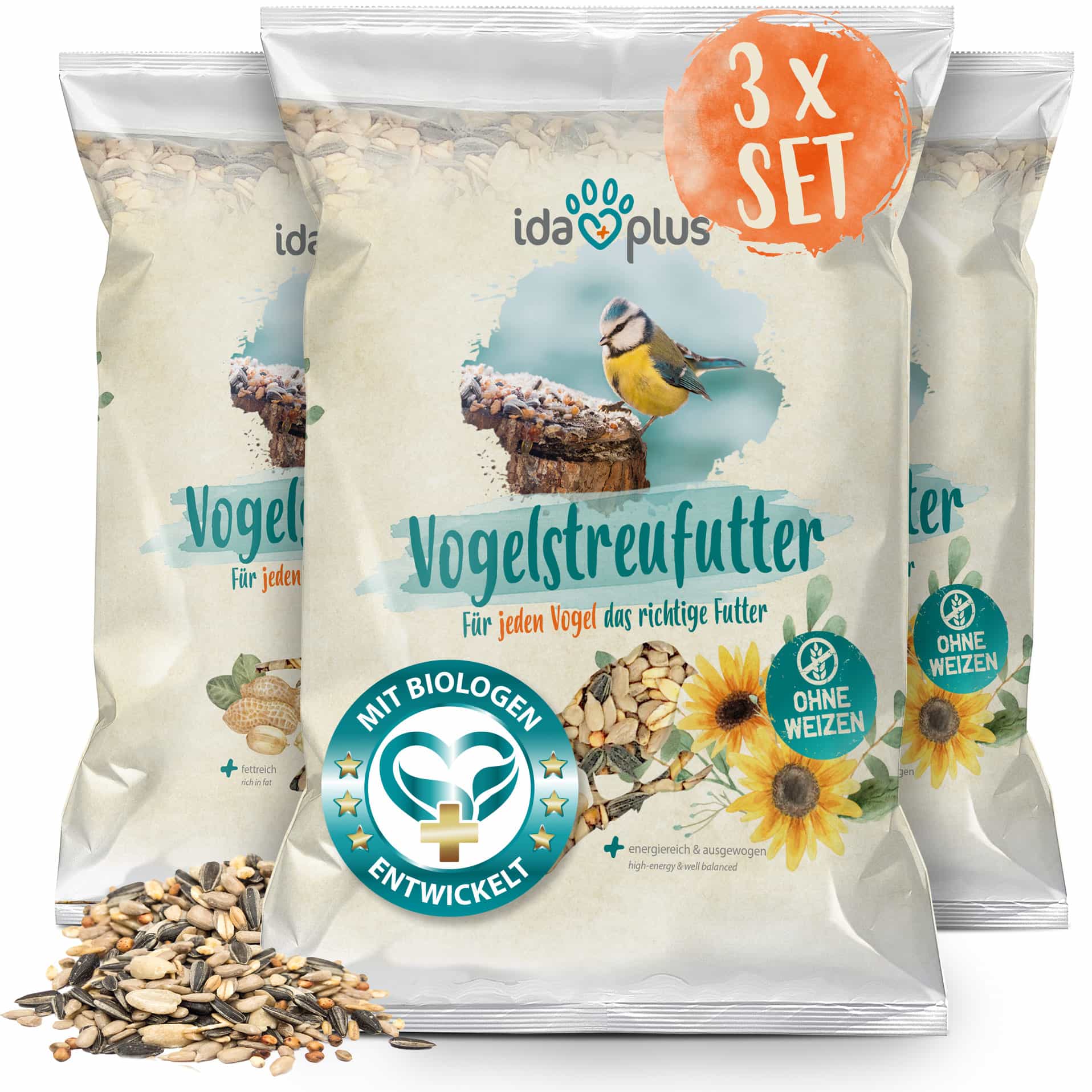 Vogelstreufutter 3erSet 3 Verpackungen neben einander mit ein bisschen Futter vor den Verpackungen